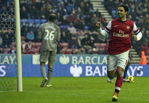 Spot on Arteta lifts Arsenal into third place