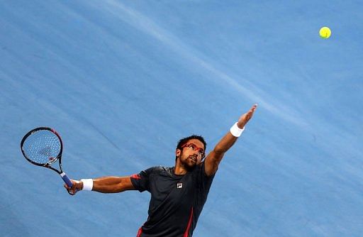 Tipsarevic cruises past Murray in Abu Dhabi