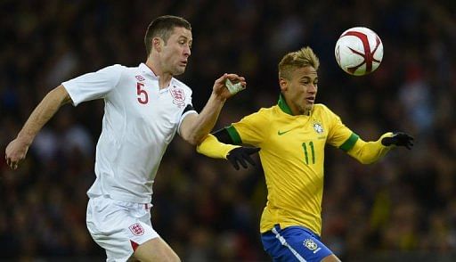 Slick England spoil Scolari's Brazil return