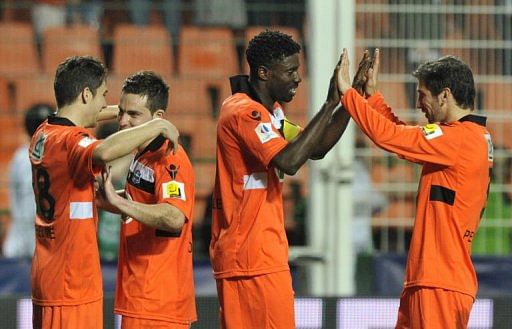 Late Aliadiere strike stuns Les Verts