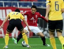 Guangzhou through despite Urawa loss, Lippi red
