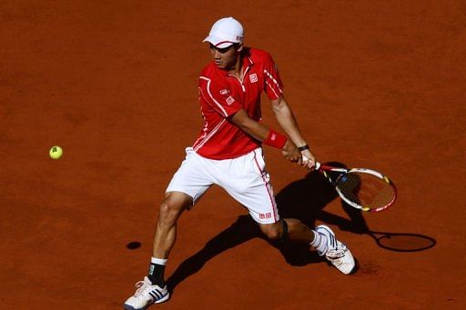 Federer ousted by Nishikori in Madrid, Nadal, Murray through