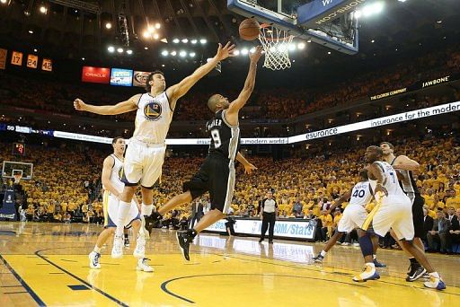 Parker shines as Spurs down Warriors for series lead