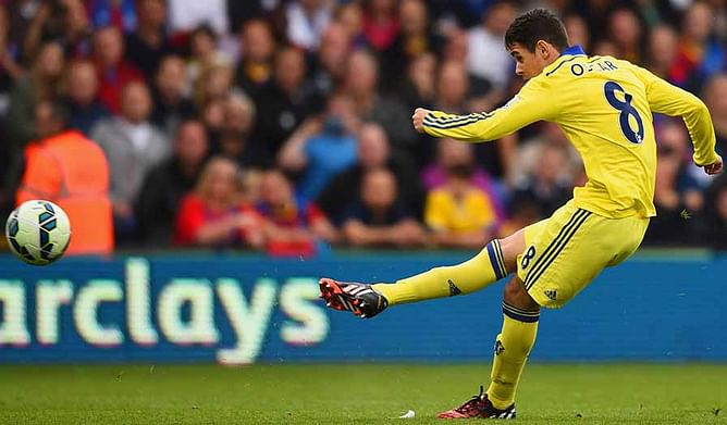 Oscar and Cesc Fabregas strengthen Chelsea's grip on the Premier League