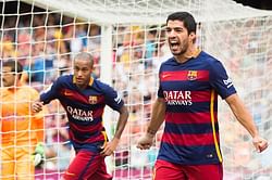 Luis Suarez's double helps Messi-less Barcelona to a 2-1 victory over Las Palmas