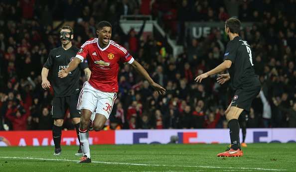Debutant Marcus Rashford helps Manchester United thrash Midtjylland 5-1 to advance in Europa League