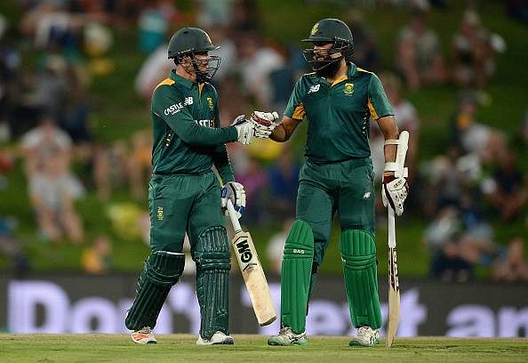 Centuries from Hashim Amla and Quinton de Kock help South Africa seal record chase