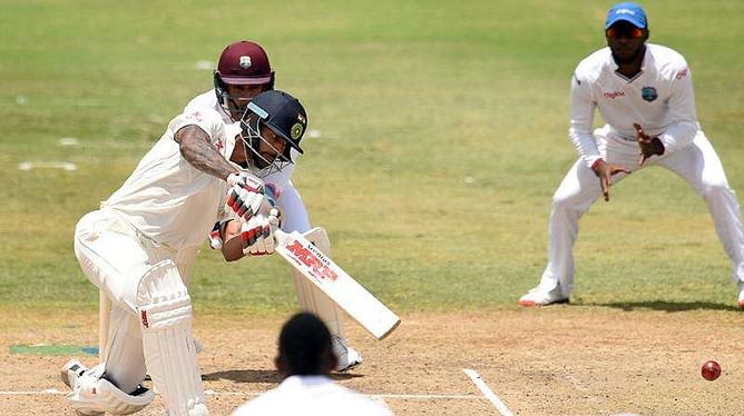 Rohit Sharma unbeaten on 54 as India end first day on a high