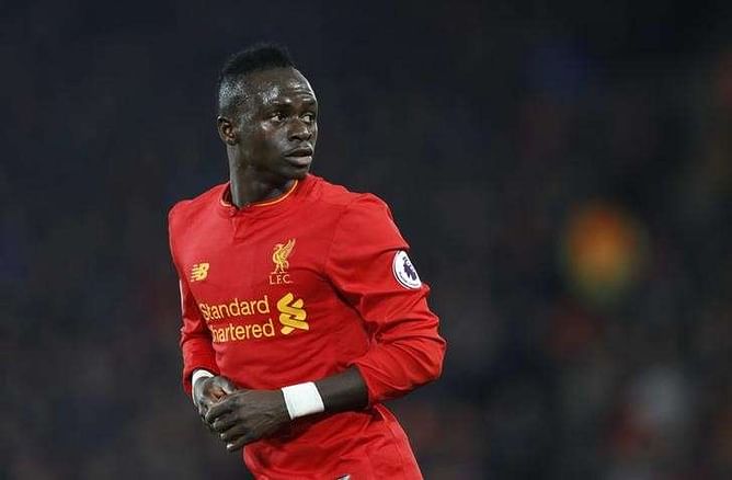Mane double puts Liverpool back on track