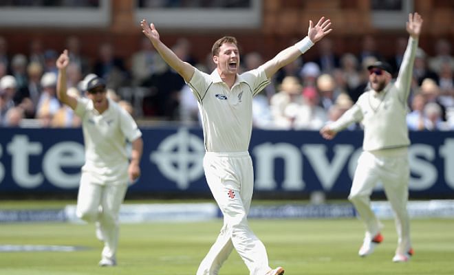 Matt Henry celebrates after picking up his first wicket in Test cricket.