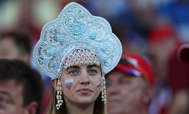 Their team may be losing, but the Russian fans are winning the headgear battle!