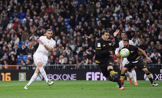 HALF-TIME: Real Madrid 1-0 Sevilla. Karim Benzema's early goal separates the two sides.