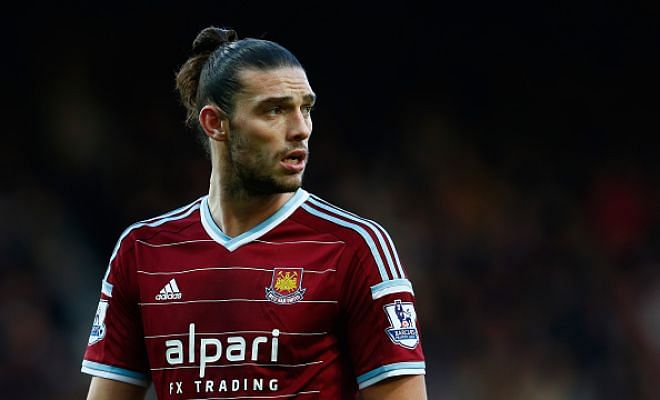 Reigning Europa League champions Sevilla are said to be interested in signing West Ham striker Andy Carroll on loan. [Times]