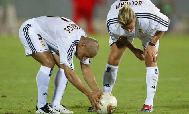 David Beckham and Roberto Carlos were teammates at Real Madrid.