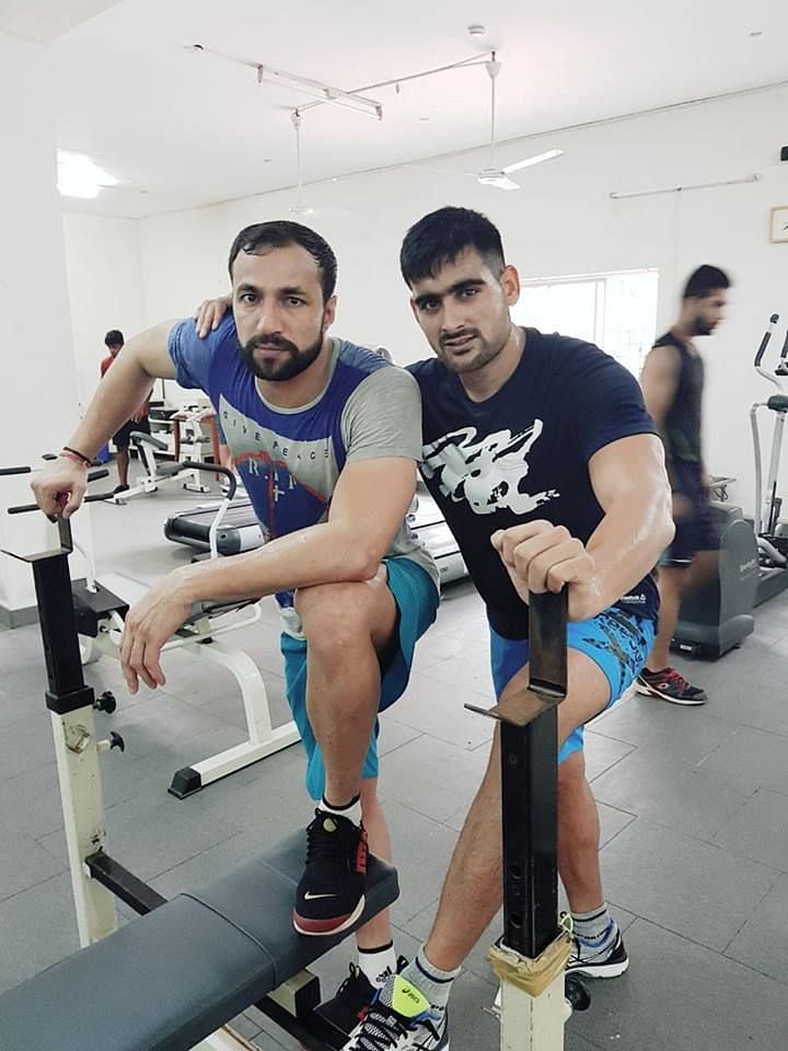 Rakesh Kumar and Rahul Chaudhari post a training session. Image credits: Telugu Titans Facebook Page