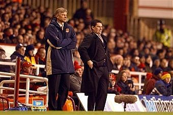 John Gregory seen with Arsene Wenger during a Premier League match