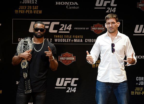 Tyron Woodley with the UFC belt, and Demian Maia