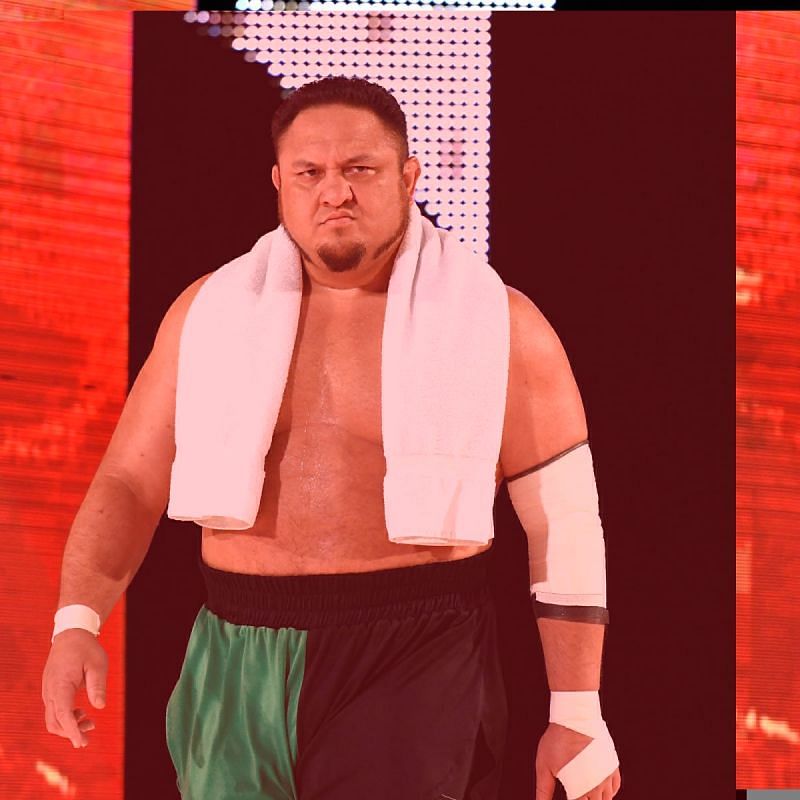 Samoa Joe sneers at his opponent as he makes his way to the squared circle.