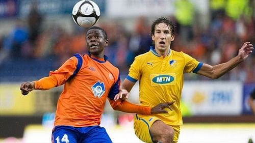 Aritz Borda (R) in Europa League action for APOEL against Aalesunds FK of Norway