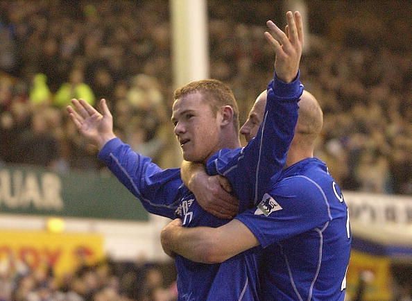 Rooney celebrates scoring
