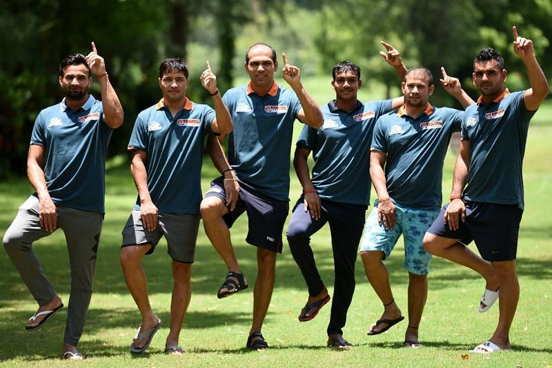 Amaresh (second from right) with his Bengal teammates and the coach.
