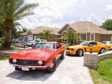10 professional wrestlers and their awesome cars