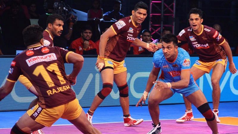 Deepak Narwal (blue)