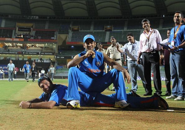 King MS Dhoni and Man of the tournament Yuvraj Singh pose with their World Cup medals