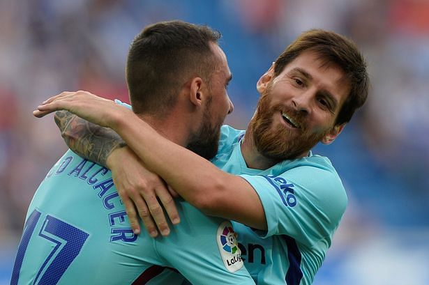 Alcacer celebrating with Messi