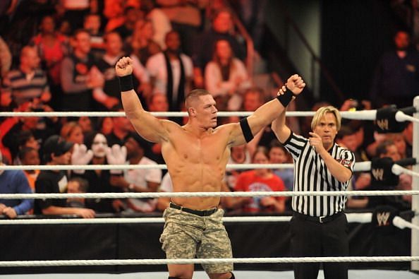 John Cena getting his hand raised on RAW