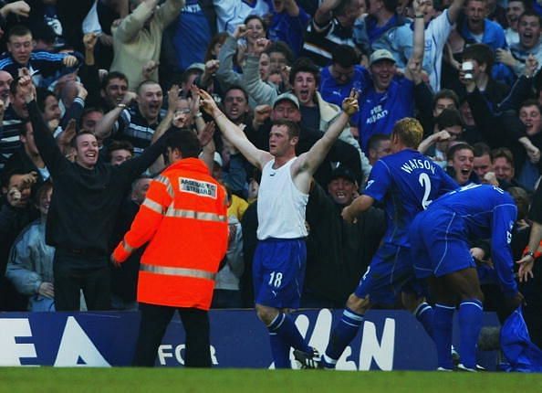 Wayne Rooney of Everton celebrates scoring the equalising goal