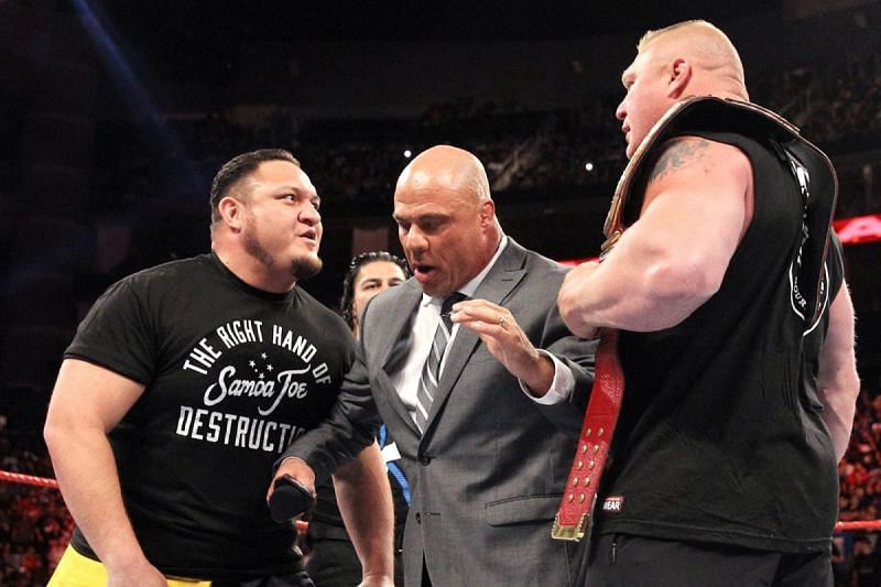 Kurt Angle stands between Samoa Joe and Brock Lesnar in a segment on Raw.