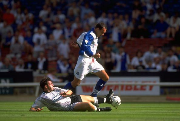 Mark Atkins of Blackburn Rovers and David Unsworth of Everton