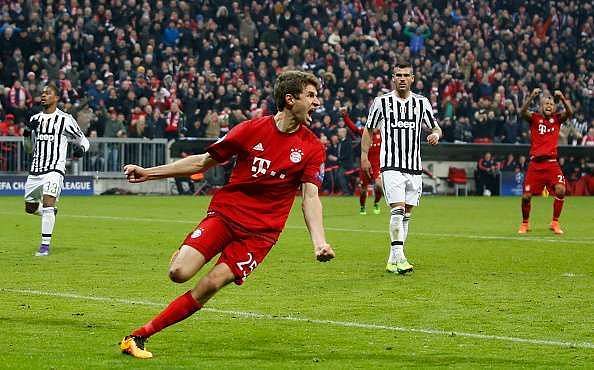 Thomas Mueller celebrates the equalizer against Juventus. 