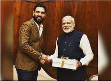 Yuvraj Singh receives a letter of appreciation from PM Modi