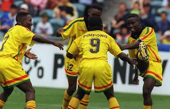 Ghana celebrate after they scored their first goal