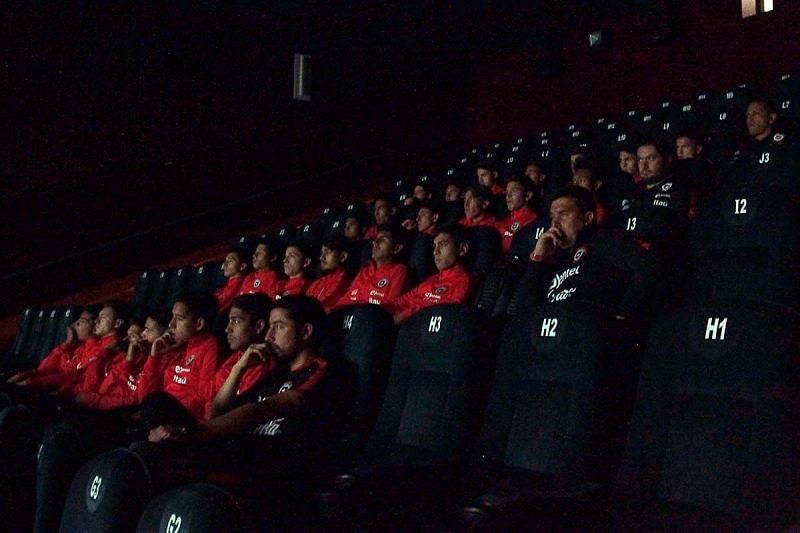 The Chile contingent with their eyes fixed on the hit Bollywood flick (image source: Chile football official website)
