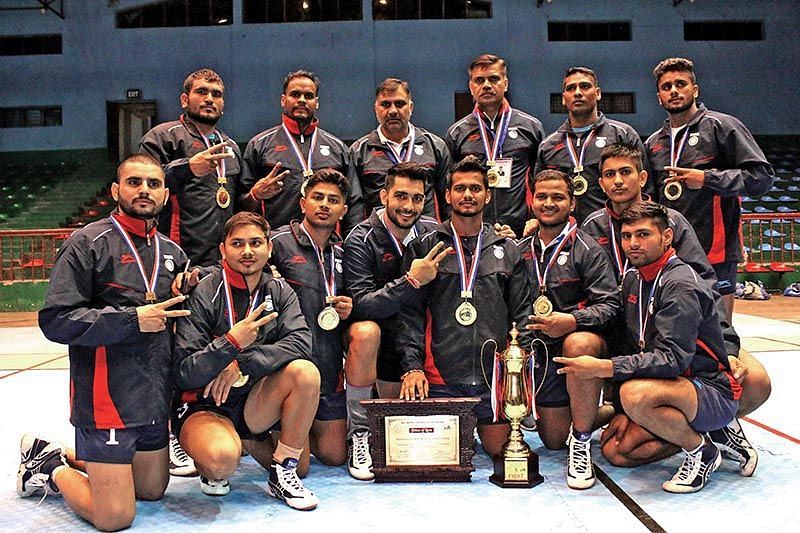 The Indian national squad with their championship spoils
