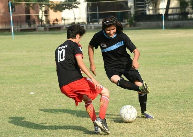 Baig playing football