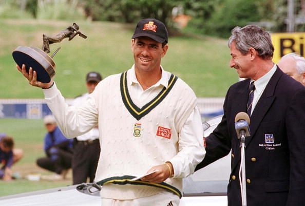 South Africa&#039;s capatin, Hansie Cronje holds the Ba