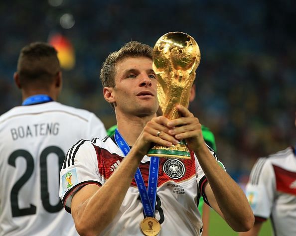 Thomas Muller with the World Cup