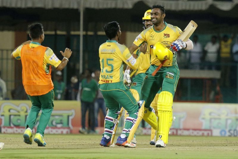 Mithun celebrates with his team-mates after sealing the match for the Bulls