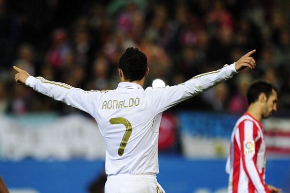 Cristiano Ronaldo celebrates scoring his hat-trick against Atletico Madrid