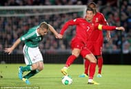 Ronaldo nutmegging Northern Ireland's captain Steven Davis.