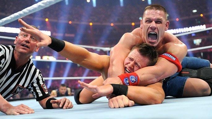 John Cena applies the STF to The Miz