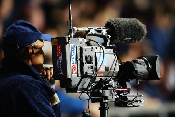 Sky Sports TV cameraman filming
