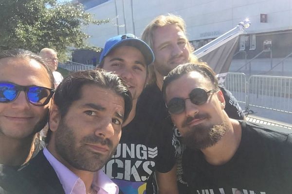 Jimmy Jacobs poses with the Bullet Club