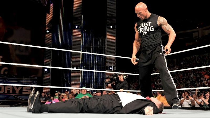 The Rock about to deliver a People&#039;s Elbow to John Laurinaitis