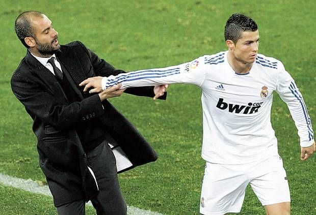 Cristiano Ronaldo pushes Pep Guardiola