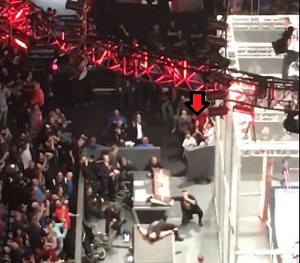 Shane McMahon&#039;s family watch on as he prepares to jump off of the cage